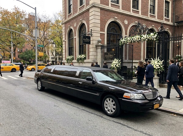 Classic white stretch wedding limo transfer service